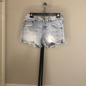 Free People light denim shorts